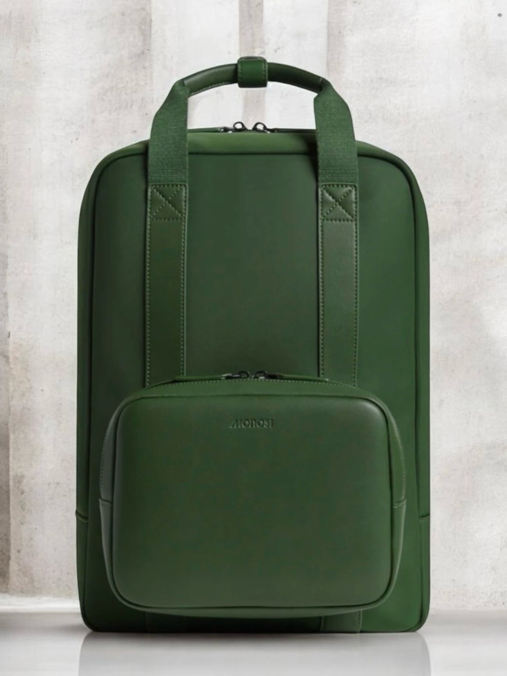 MONOS Metro Backpack In Green with quick Snap Modular Kit System.